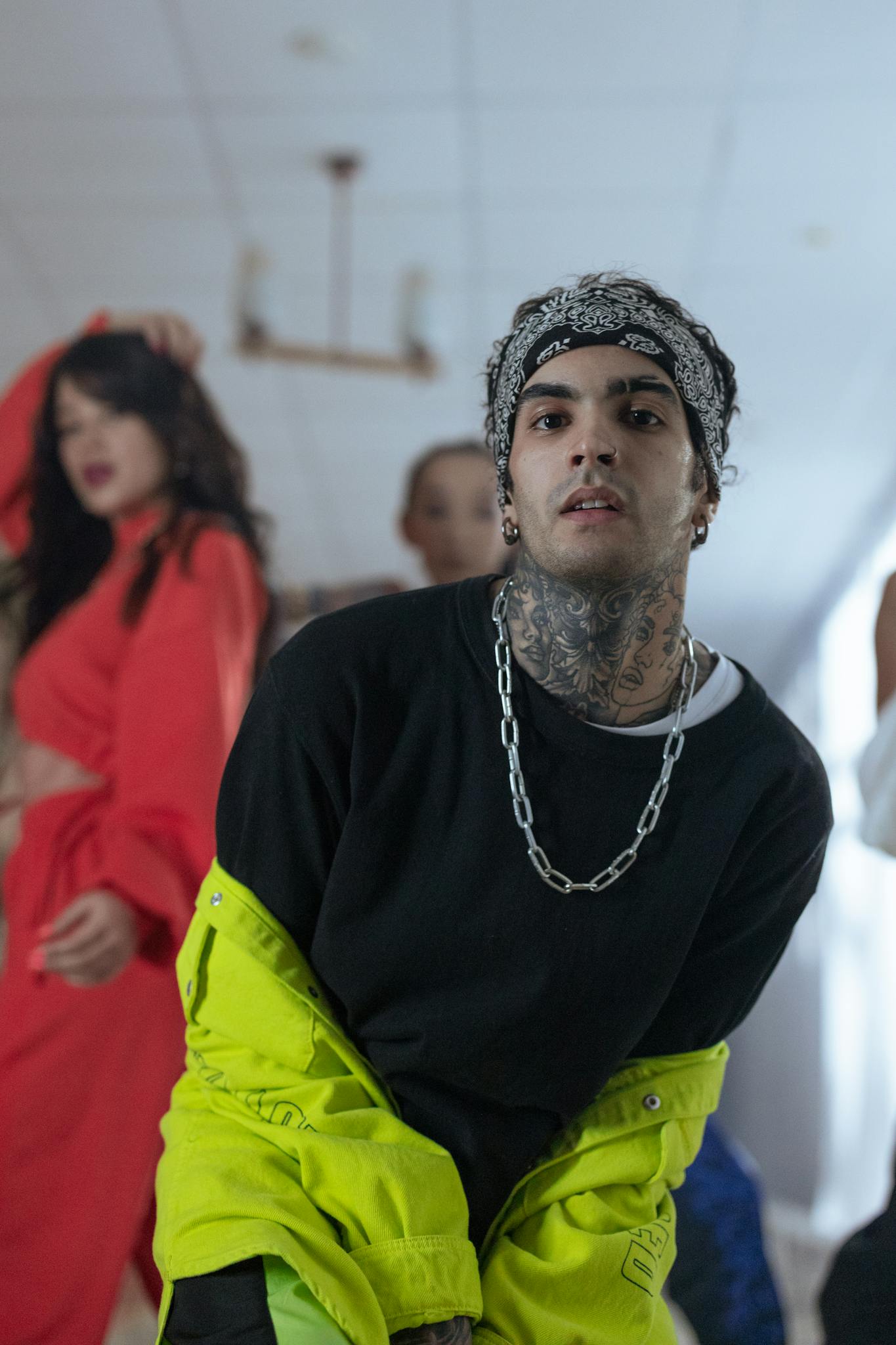 A dynamic group of young dancers performing hip hop indoors, showcasing style and energy.