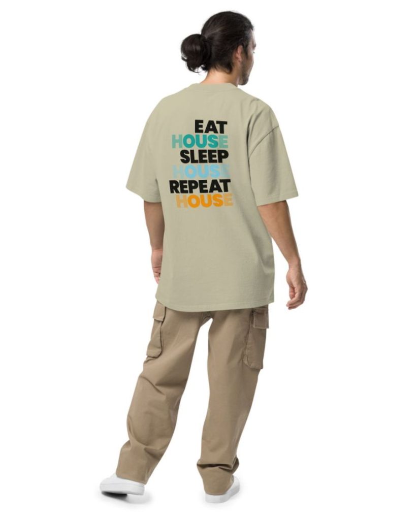 Model wearing the oversized tee in sage