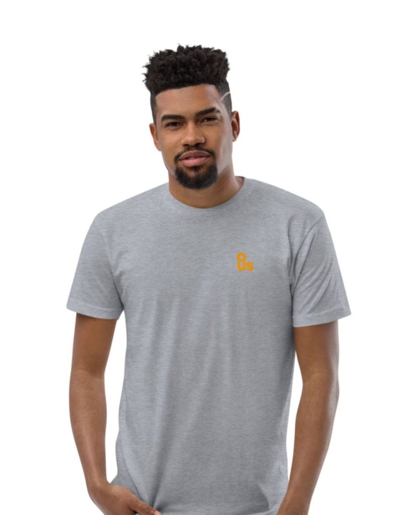 Model wearing the fitted tee in heather grey